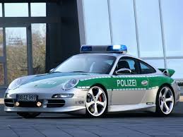 http://t3.gstatic.com/images?q=tbn:ehs3uMTMXenVhM%3Ahttp://cars.88000.org/wallpapers/80/Porsche_911_Police_Car.jpg