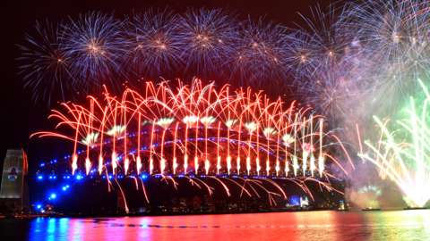 The midnight fireworks light up Sydney Harbour and the Sydney Harbour Bridge during New Year's Eve celebrations in Sydney, Australia, 01 January 2021