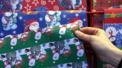 Christmas shopper buys wrapping paper