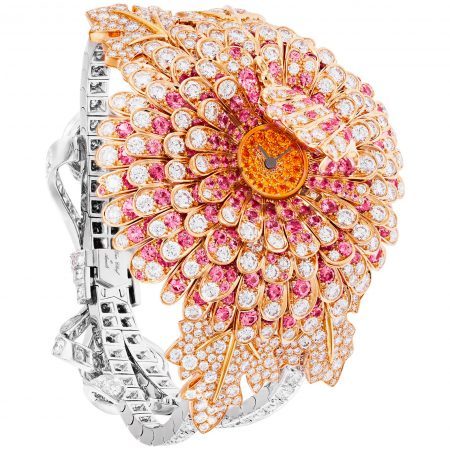 Van Cleef & Arpels “Chrysantheme Secret” timepiece featuring diamonds, pink sapphires and spessartite garnets set in 18K yellow, white and rose gold