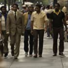 Denzel Washington, Chiwetel Ejiofor, and Common in American Gangster (2007)