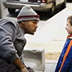 Will Smith and Atticus Shaffer in Hancock (2008)